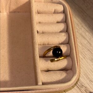 Elegant Gold and Black Ring